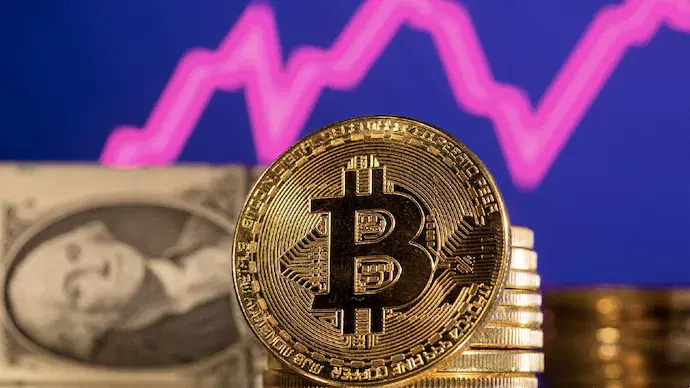 Bitcoin hits record high above $124,000